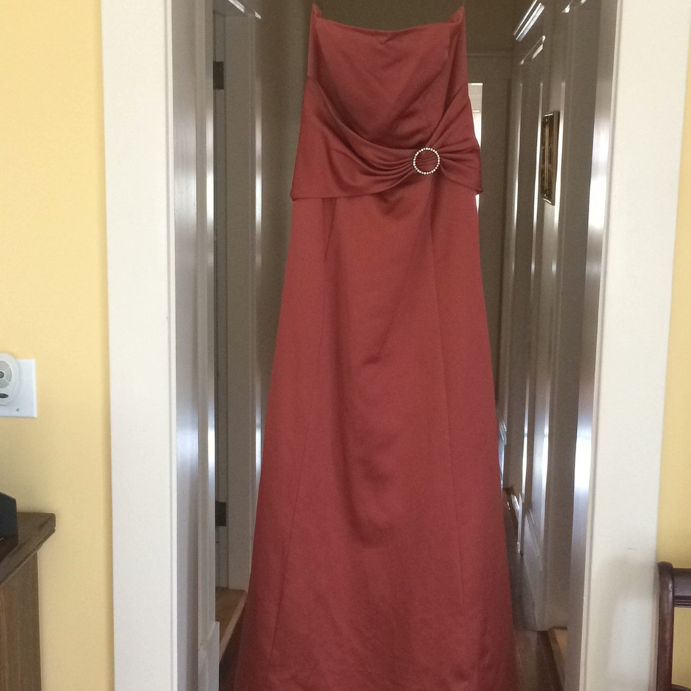 Beautiful Joanie G strapless floor-length gown.